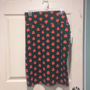 LuLaRoe Cassie. Green w/peach geometric pattern. M